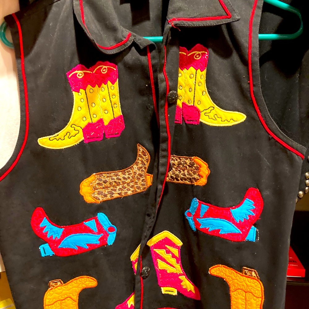 Western hip vest, cowboy boots, rodeo